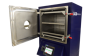 Vacuum oven for nuclear transmitter processing, chamber door open