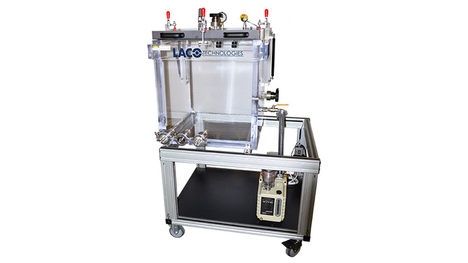Cart-mounted product testing system with a vacuum pump and clear acrylic cube vacuum chamber