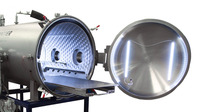 Image showing interior of vacuum chamber with roll our platen and viewports